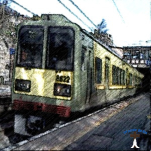 Sandycove station with Dart train.